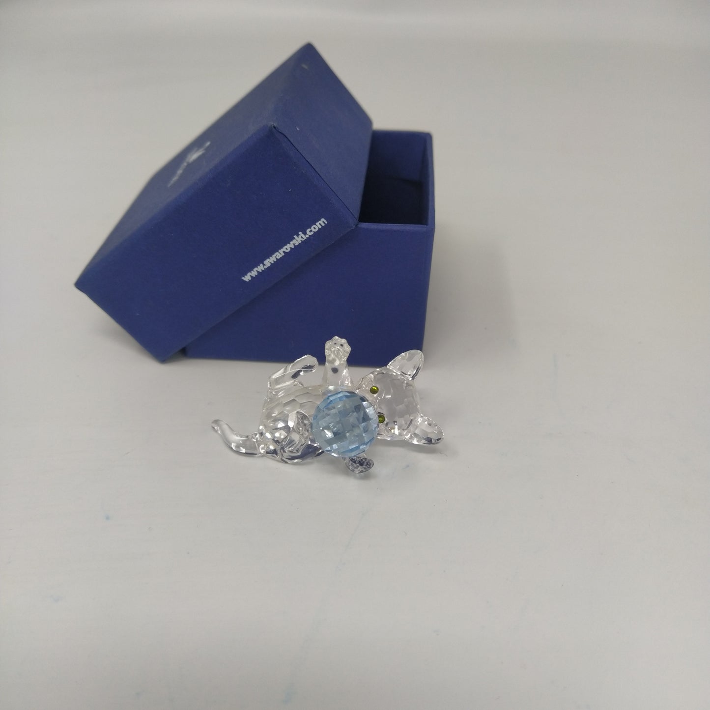 Swarovski Gattino trasparente con palla azzurra