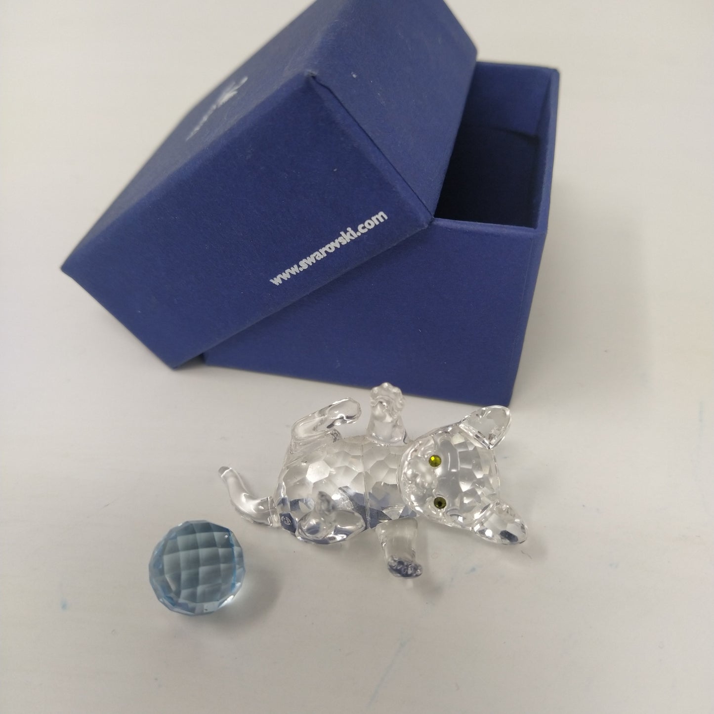 Swarovski Gattino trasparente con palla azzurra