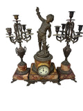 Pendola Parigina In Antimonio E Marmo Scultura Bambino + Coppia Candelabri 5 Braccia (parti Mancanti) Datazione 1800